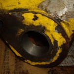 расточенное отверстие в проушине кронштейна с запрессованой ремонтной втулкой